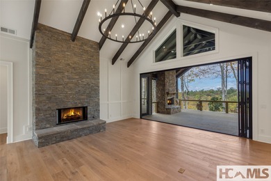 Nestled within the gates of Wildcat Cliffs Country Club but part