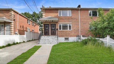 Newly Renovated Brick Two-Family House located within a block - photo 1