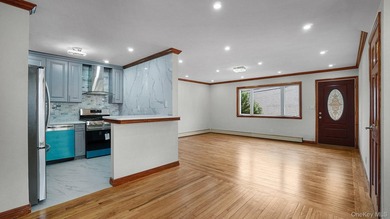 Newly Renovated Brick Two-Family House located within a block - photo 6