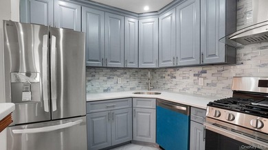 Newly Renovated Brick Two-Family House located within a block - photo 8
