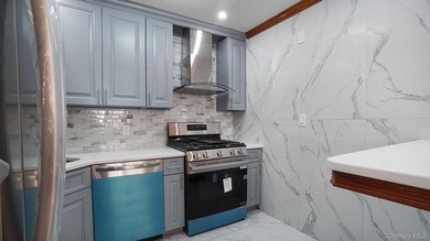 Newly Renovated Brick Two-Family House located within a block - photo 9