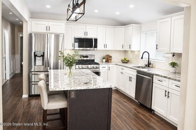 Welcome to this well maintained, fully detached 2-family home in - photo 6