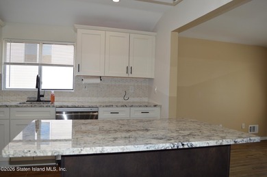 Welcome to this well maintained, fully detached 2-family home in - photo 8