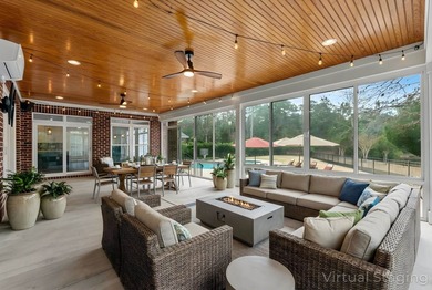 Stacking glass doors, a heated and cooled sunroom, and three - photo 4