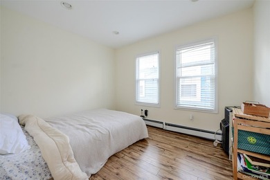 Welcome to this beautifully renovated raised ranch in Long - photo 11
