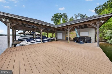 Remarkable waterfront lot! 3 stall Boathouse with huge sunning - photo 11