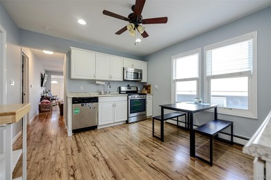 Welcome to this beautifully renovated raised ranch in Long - photo 12