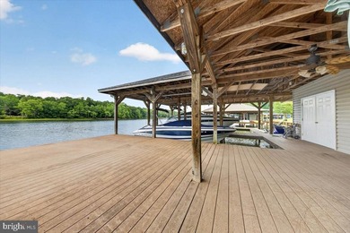 Remarkable waterfront lot! 3 stall Boathouse with huge sunning - photo 12