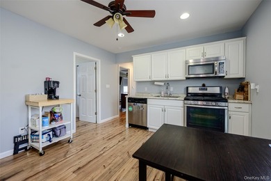 Welcome to this beautifully renovated raised ranch in Long - photo 13