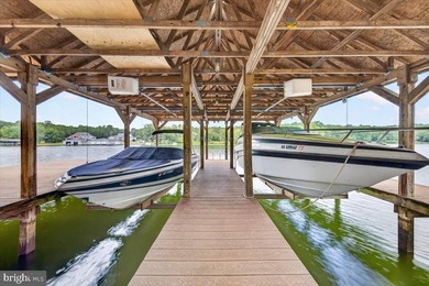 Remarkable waterfront lot! 3 stall Boathouse with huge sunning - photo 17