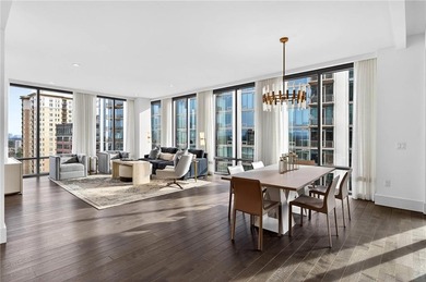 Positioned as a refined corner residence, this professionally