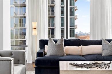 Positioned as a refined corner residence, this professionally