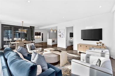 Positioned as a refined corner residence, this professionally