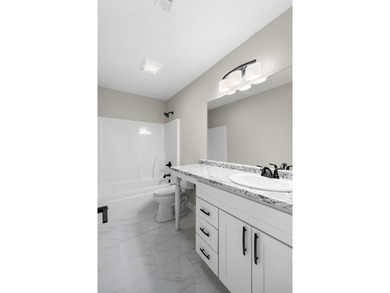 Excellent custom built home with year round lakefront water. 4 - photo 36