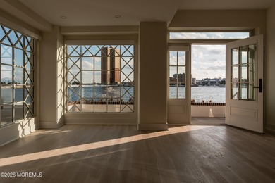 An architecturally stunning, fully renovated waterfront building