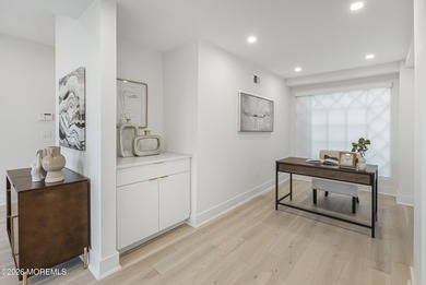 An architecturally stunning, fully renovated waterfront building