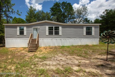 Lake Home For Sale in Florahome, Florida