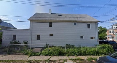 Welcome to this spacious 2-family home in Staten Island, sitting - photo 3