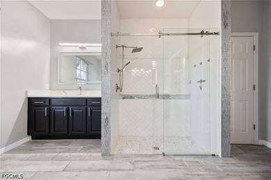 The spacious, open-concept floor plan features two living areas - photo 12