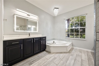 The spacious, open-concept floor plan features two living areas - photo 13