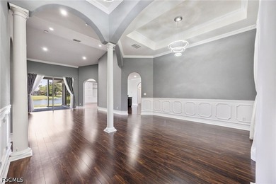 The spacious, open-concept floor plan features two living areas - photo 15