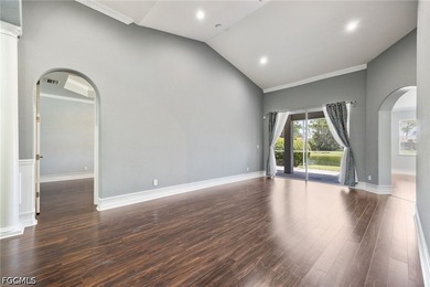 The spacious, open-concept floor plan features two living areas - photo 18