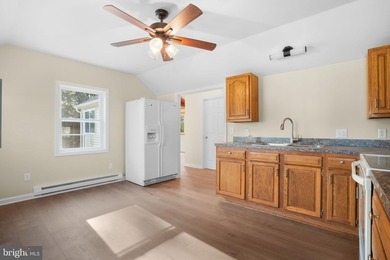 Practically brand new, this beautifully rebuilt rancher on - photo 3