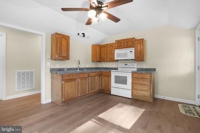 Practically brand new, this beautifully rebuilt rancher on - photo 4