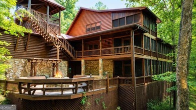 Tucked into a private wooded setting on top of the mountain in - photo 7