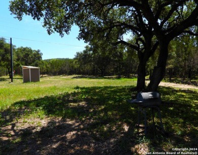 Imagine your own slice of paradise on a picturesque tree-shaded - Lake Lot For Sale in Lakehills, Texas