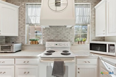 Tucked away on 15 serene, wooded acres through two private - photo 14