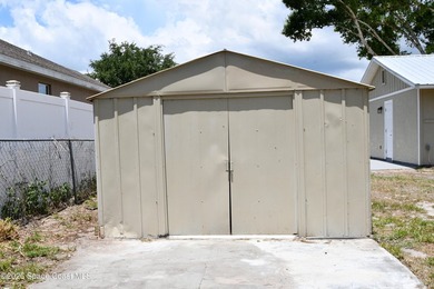 This updated Palm Bay home is set just off a main road, making - photo 15