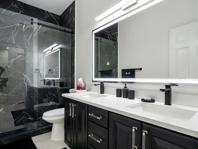 Completely remodeled 3-bedroom , 3-bathroom residence located in - photo 18