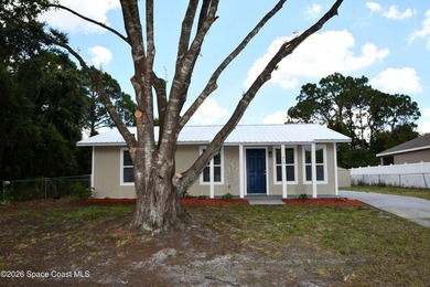 This updated Palm Bay home is set just off a main road, making - photo 18