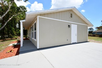 This updated Palm Bay home is set just off a main road, making - photo 19