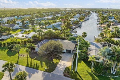 WATERFRONT GEM WITH A PRIVATE DOCK, OCEAN ACCESS & NO FIXED - photo 1