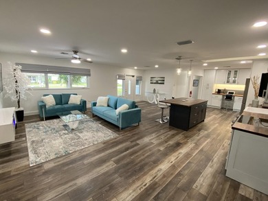 WATERFRONT GEM WITH A PRIVATE DOCK, OCEAN ACCESS & NO FIXED - photo 4