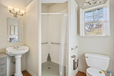 Tucked away on 15 serene, wooded acres through two private - photo 26