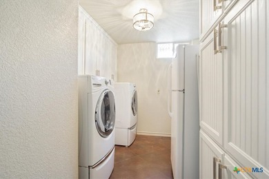 Tucked away on 15 serene, wooded acres through two private - photo 27