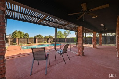 This well-maintained home sits on an expansive corner lot and - photo 28
