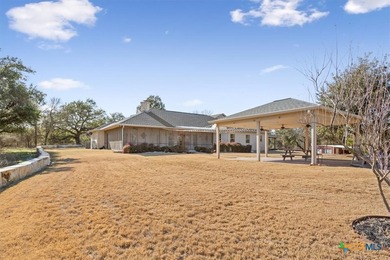 Tucked away on 15 serene, wooded acres through two private - photo 32