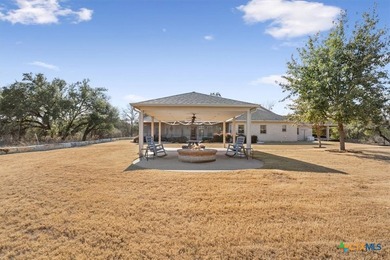 Tucked away on 15 serene, wooded acres through two private - photo 33