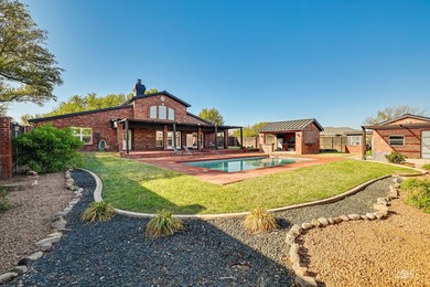 This well-maintained home sits on an expansive corner lot and - photo 34