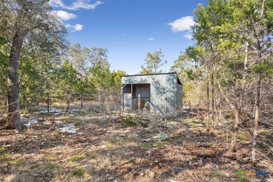 Tucked away on 15 serene, wooded acres through two private - photo 37