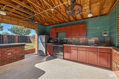 This well-maintained home sits on an expansive corner lot and - photo 39