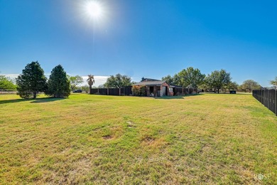 This well-maintained home sits on an expansive corner lot and - photo 46