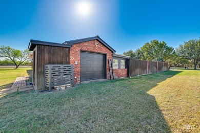 This well-maintained home sits on an expansive corner lot and - photo 47