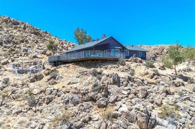 Welcome to the pinnacle of desert living - a custom-designed - photo 1