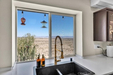 Welcome to the pinnacle of desert living - a custom-designed - photo 8