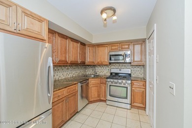 Welcome to this well-maintained 2-bedroom ground level condo - photo 10